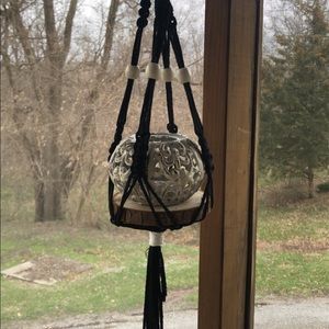 Macrame hanging plant holders, hanging light.